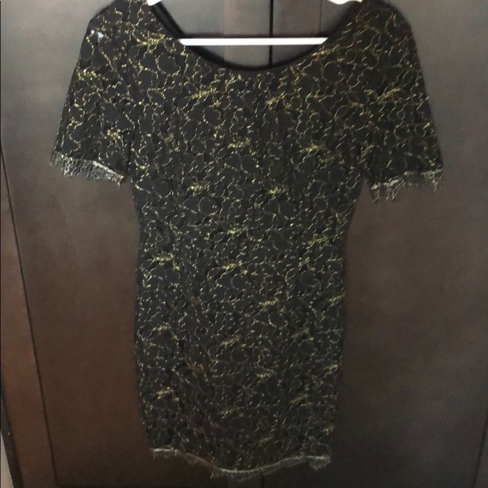 Black and gold details dress.